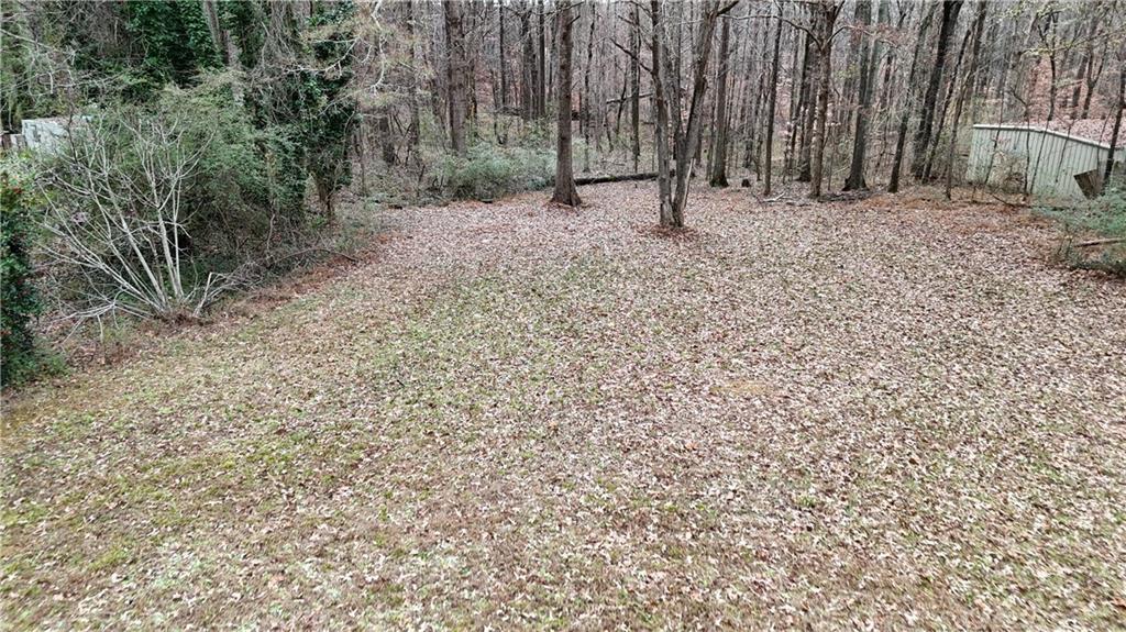 7307 Williams Road Flowery Branch, GA 30542 - Photo 26 of 30 a view of outdoor space with sink