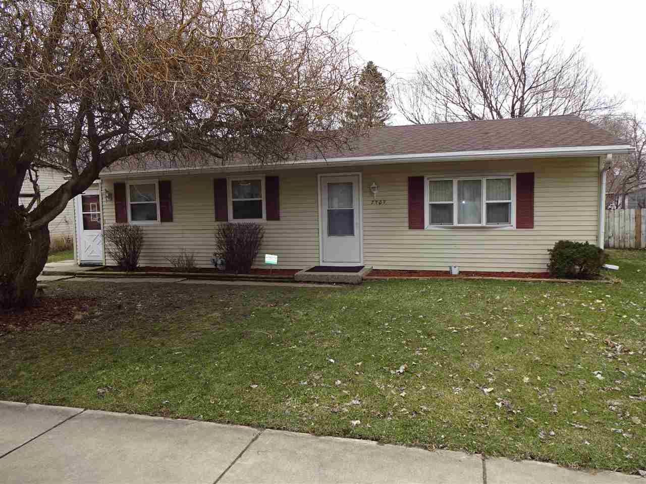 7707 Randy Road Machesney Park, IL 61115 - Photo 1 of 17 a house view with a garden space