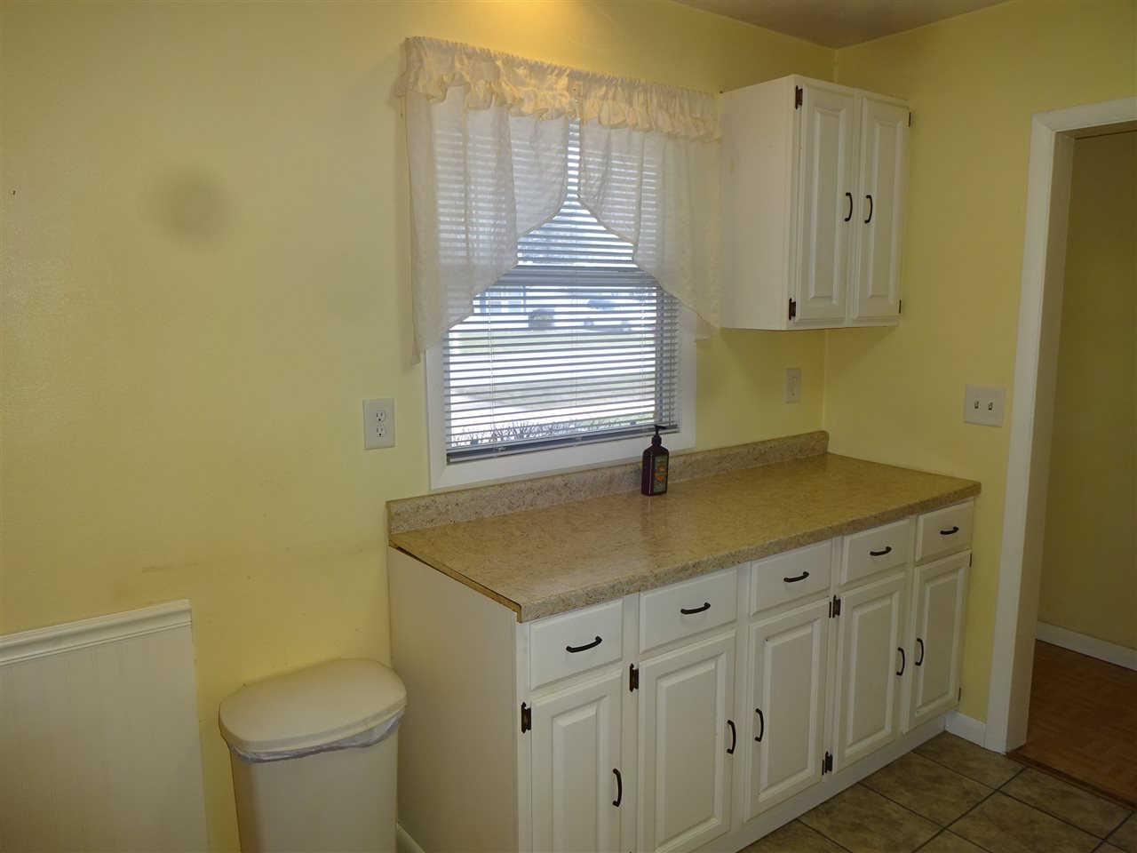 7707 Randy Road Machesney Park, IL 61115 - Photo 7 of 17 a bathroom with a granite countertop sink and a toilet