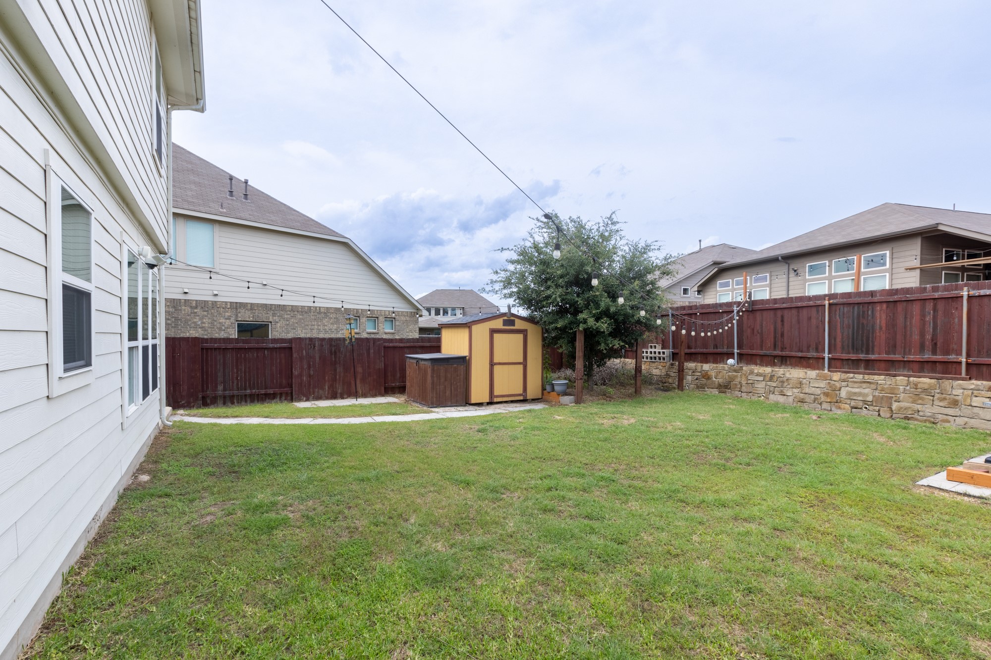 263 Joseph Drive Buda, TX 78610 - Photo 27 of 27 a view of a yard in front of house