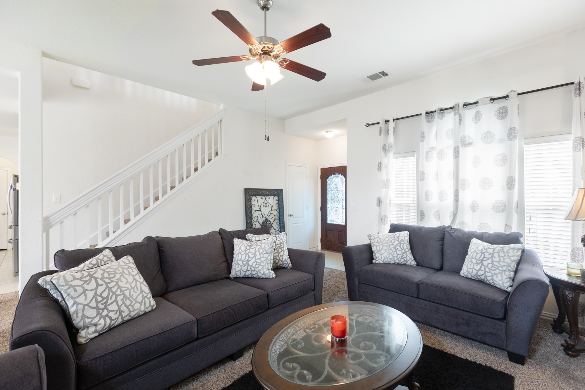 263 Joseph Drive Buda, TX 78610 - Photo 7 of 27 a living room with furniture and a large window