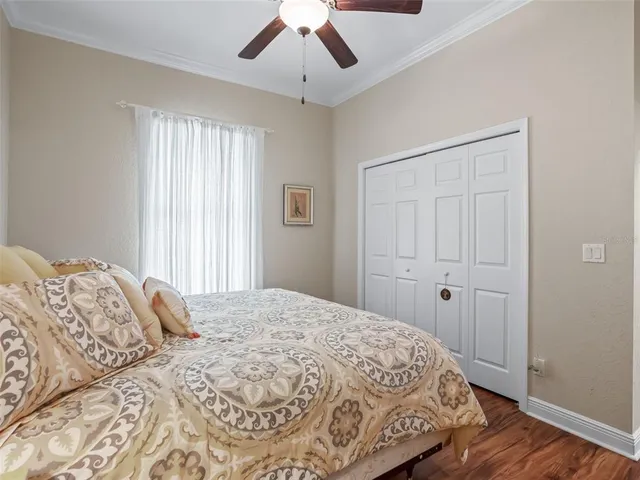 an aerial view of residential houses with outdoor space and swimming pool
