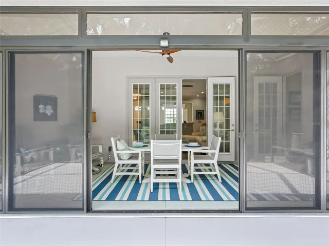 a view of a yard with an outdoor seating