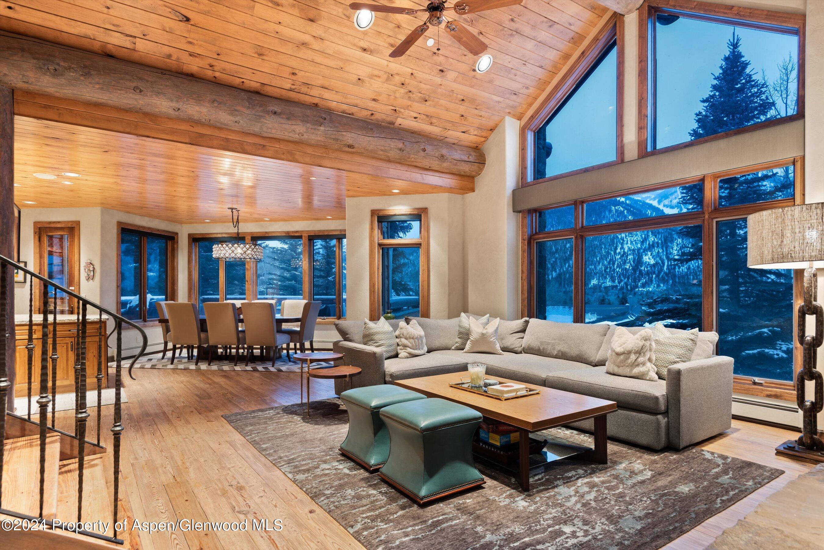 395 Silverlode Drive Aspen, CO 81611 - Photo 4 of 19 a building outdoor space with patio furniture and wooden floor