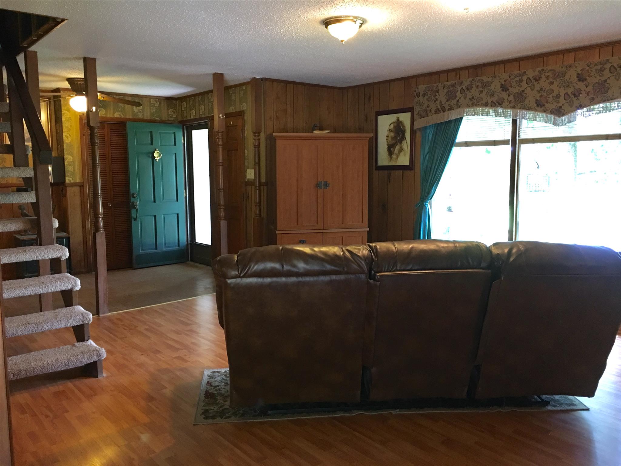 209 Bonnertown Road Five Points, TN 38457 - Photo 13 of 30 a living room with furniture and a fireplace