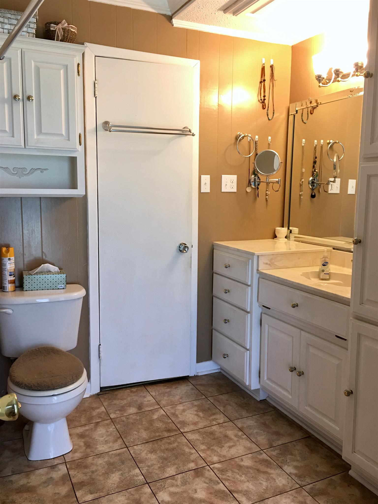 209 Bonnertown Road Five Points, TN 38457 - Photo 21 of 30 a bathroom with a granite countertop toilet sink and a mirror