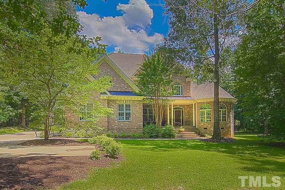 120 Bayleaf Drive Raleigh, NC 27615 - Photo 1 of 25 front view of a house with a garden