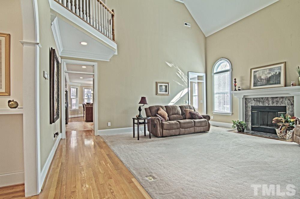 120 Bayleaf Drive Raleigh, NC 27615 - Photo 14 of 25 a living room with furniture and a fireplace