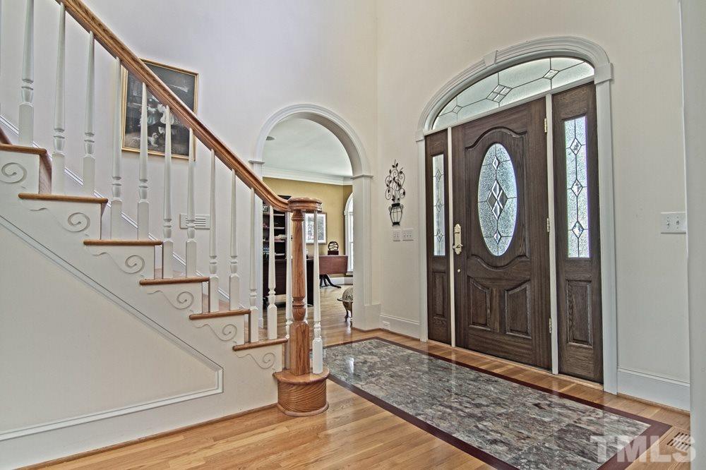 120 Bayleaf Drive Raleigh, NC 27615 - Photo 3 of 25 a view of staircase with large mirror