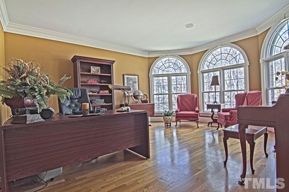 120 Bayleaf Drive Raleigh, NC 27615 - Photo 4 of 25 a living room with furniture and a large window