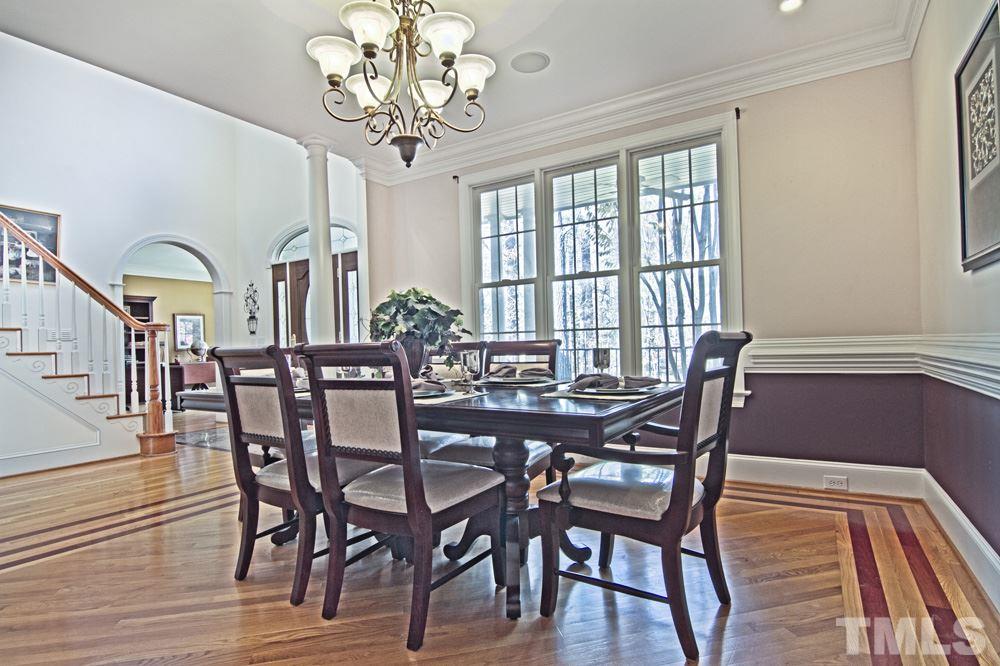 120 Bayleaf Drive Raleigh, NC 27615 - Photo 5 of 25 a view of a dining room with furniture window and wooden floor