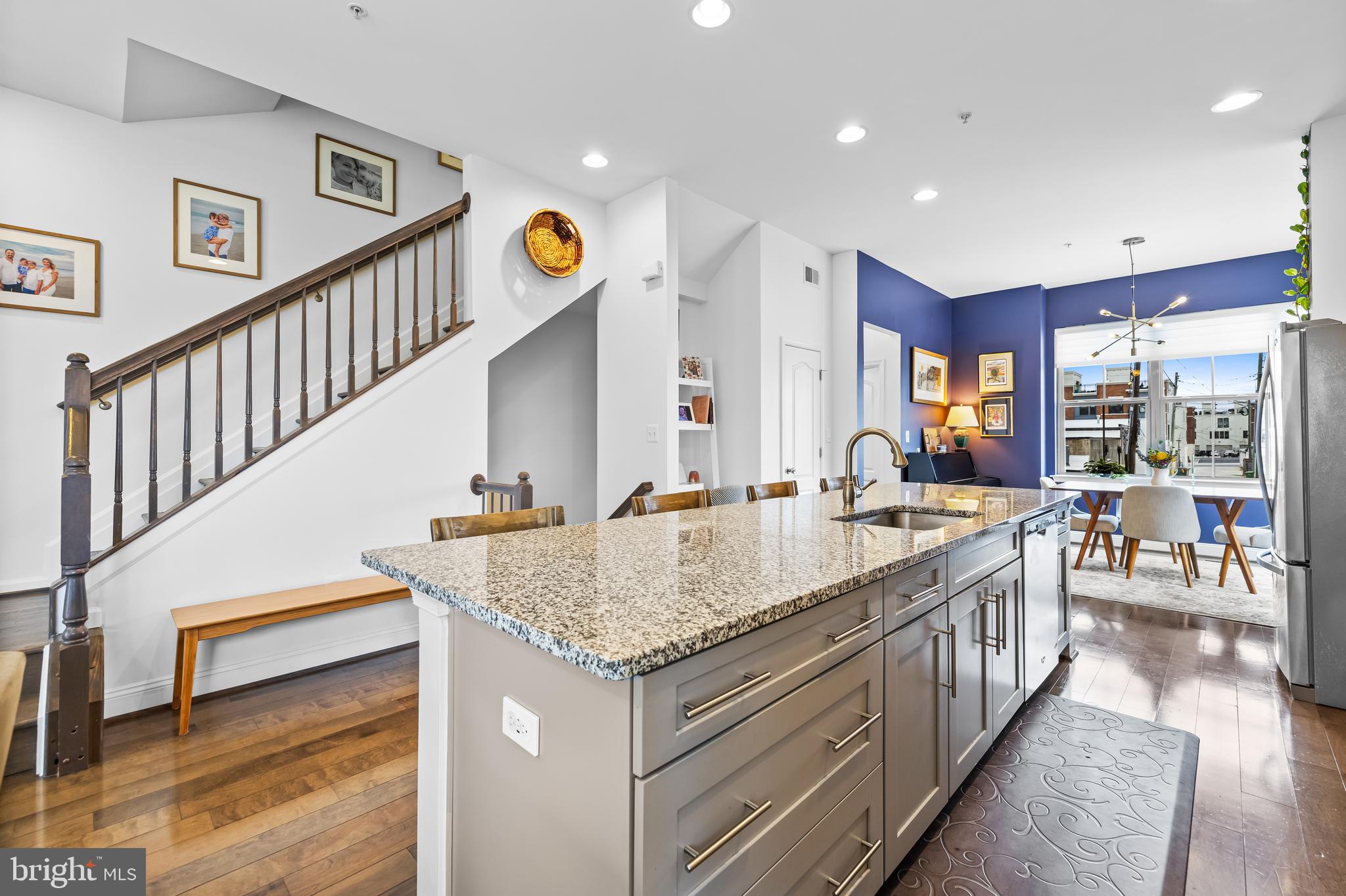 1201 Andre Street Baltimore, MD 21230 - Photo 13 of 39 a bathroom with a granite countertop sink and a large mirror