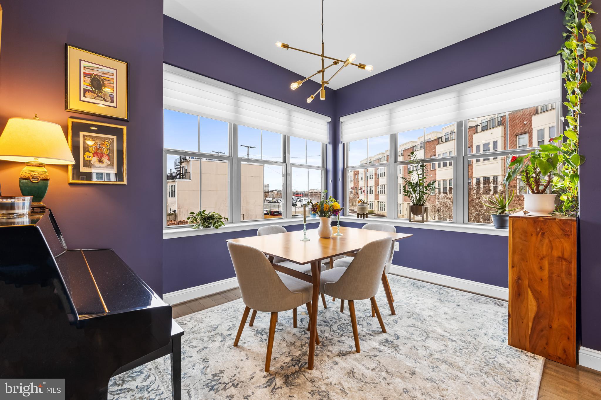 1201 Andre Street Baltimore, MD 21230 - Photo 16 of 39 a dining room with furniture a chandelier and window