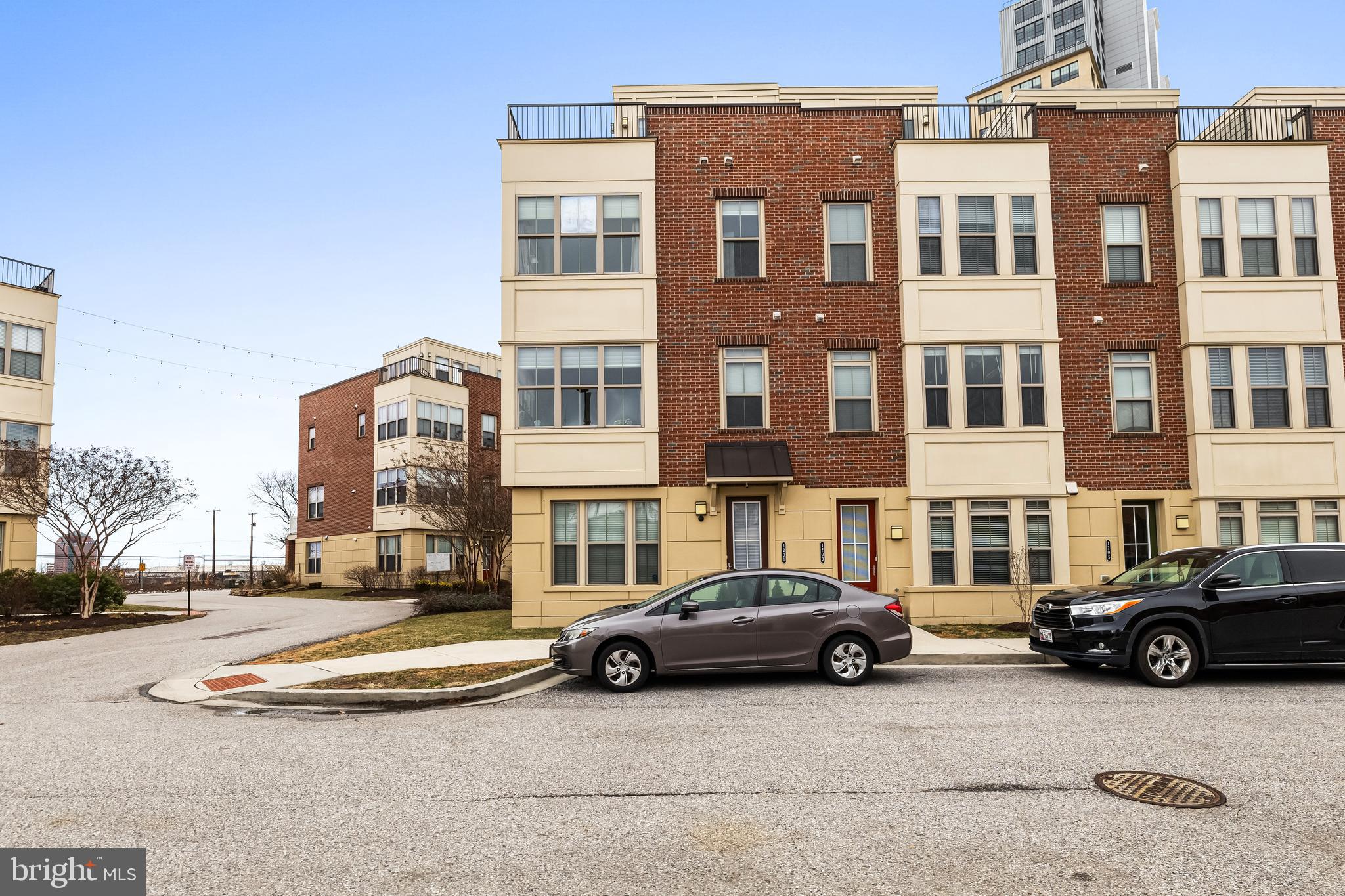 1201 Andre Street Baltimore, MD 21230 - Photo 2 of 39 a view of a cars parked in front of a building