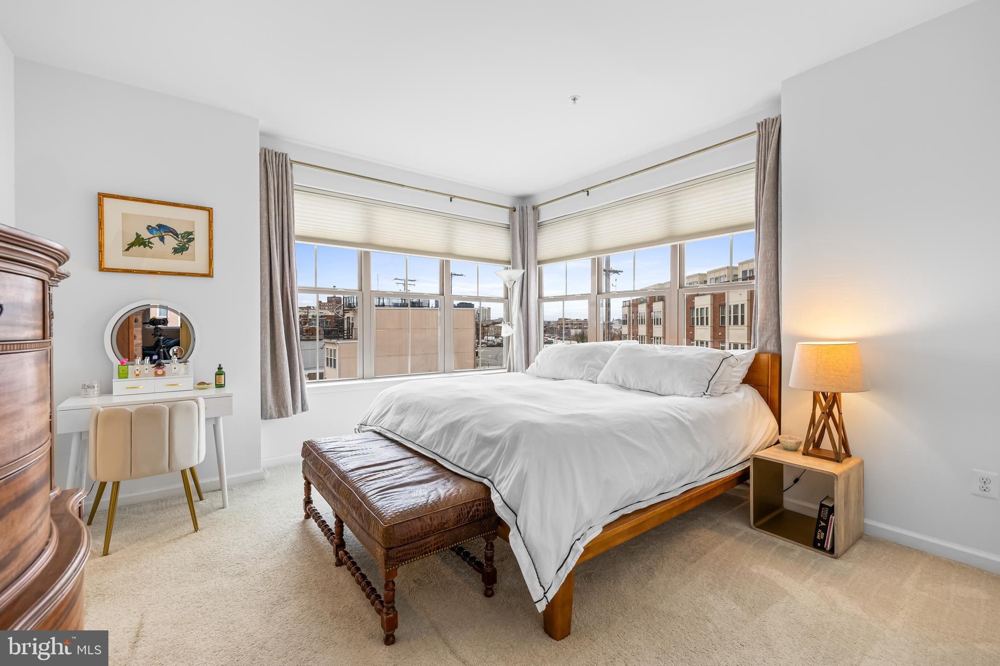 1201 Andre Street Baltimore, MD 21230 - Photo 21 of 39 a bedroom with a bed and a large window