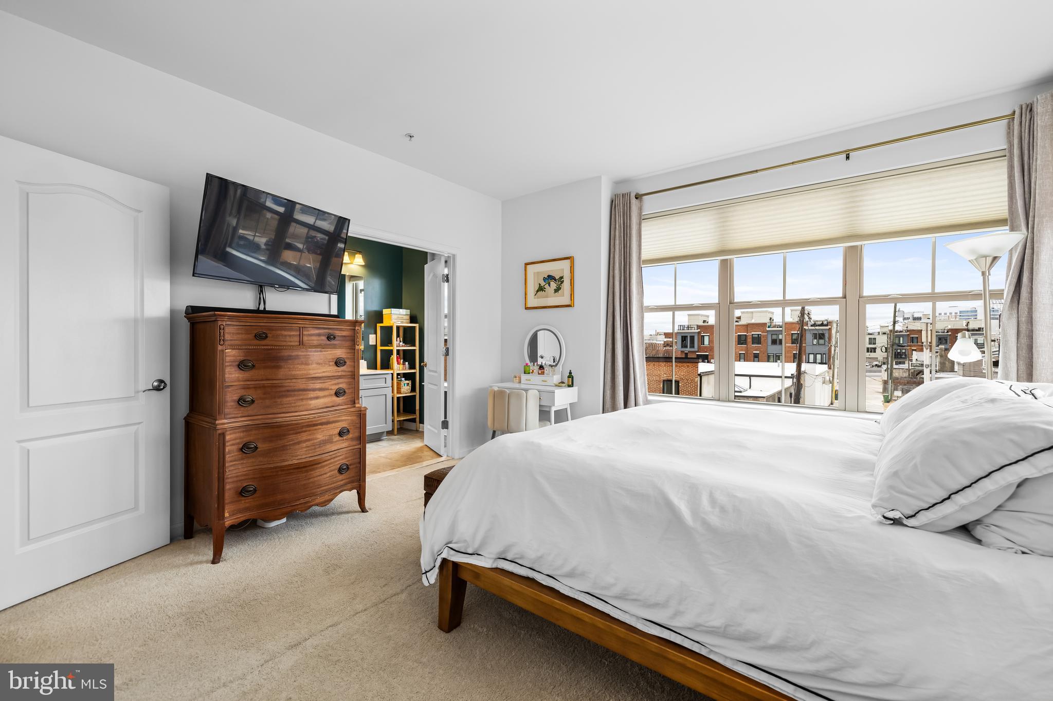 1201 Andre Street Baltimore, MD 21230 - Photo 22 of 39 a bedroom with a bed and a large window