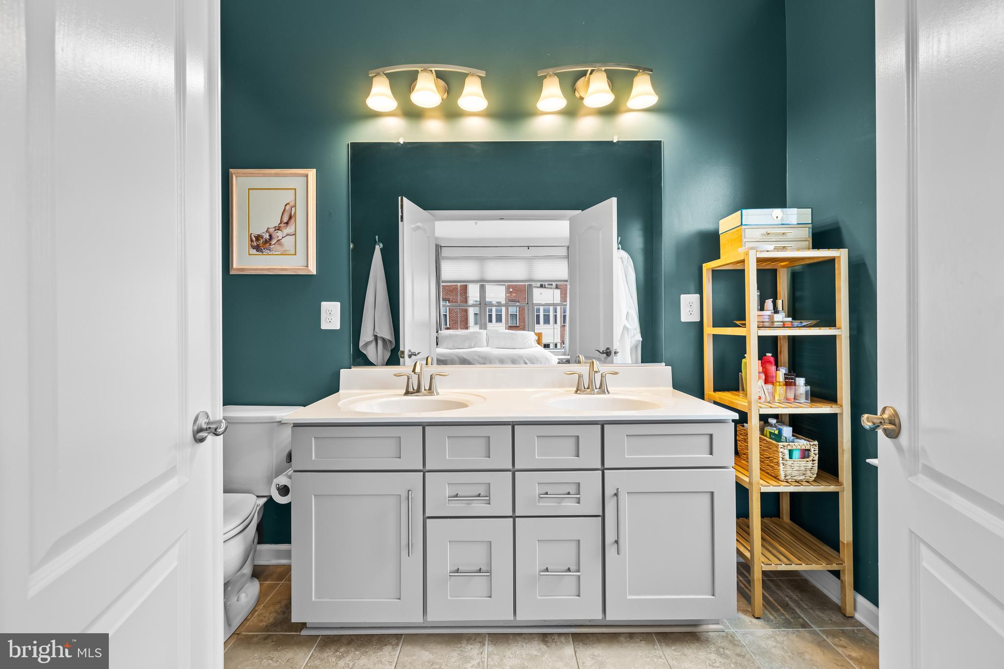 1201 Andre Street Baltimore, MD 21230 - Photo 23 of 39 a room with a sink and a mirror