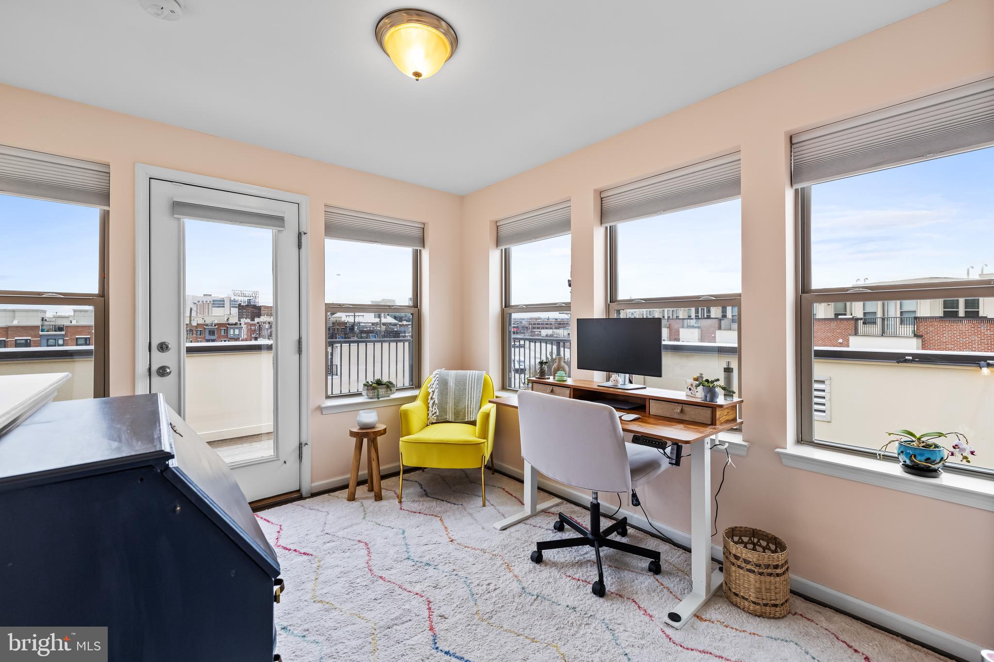 1201 Andre Street Baltimore, MD 21230 - Photo 30 of 39 a view of a workspace with furniture and a window