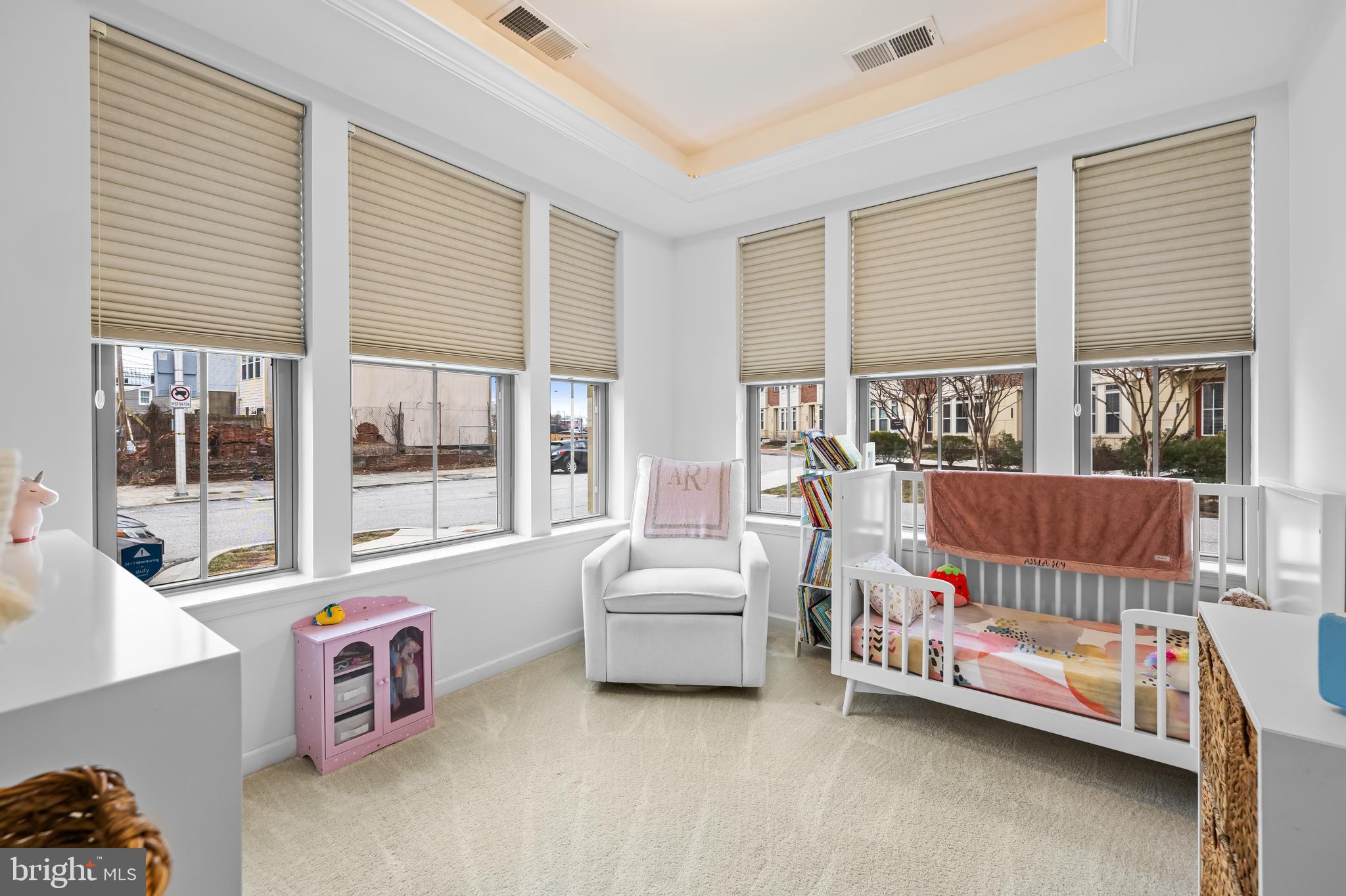 1201 Andre Street Baltimore, MD 21230 - Photo 5 of 39 a bedroom with furniture and a large window