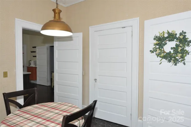 a bedroom with a bed and a table