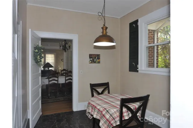 a view of a livingroom with furniture and front door