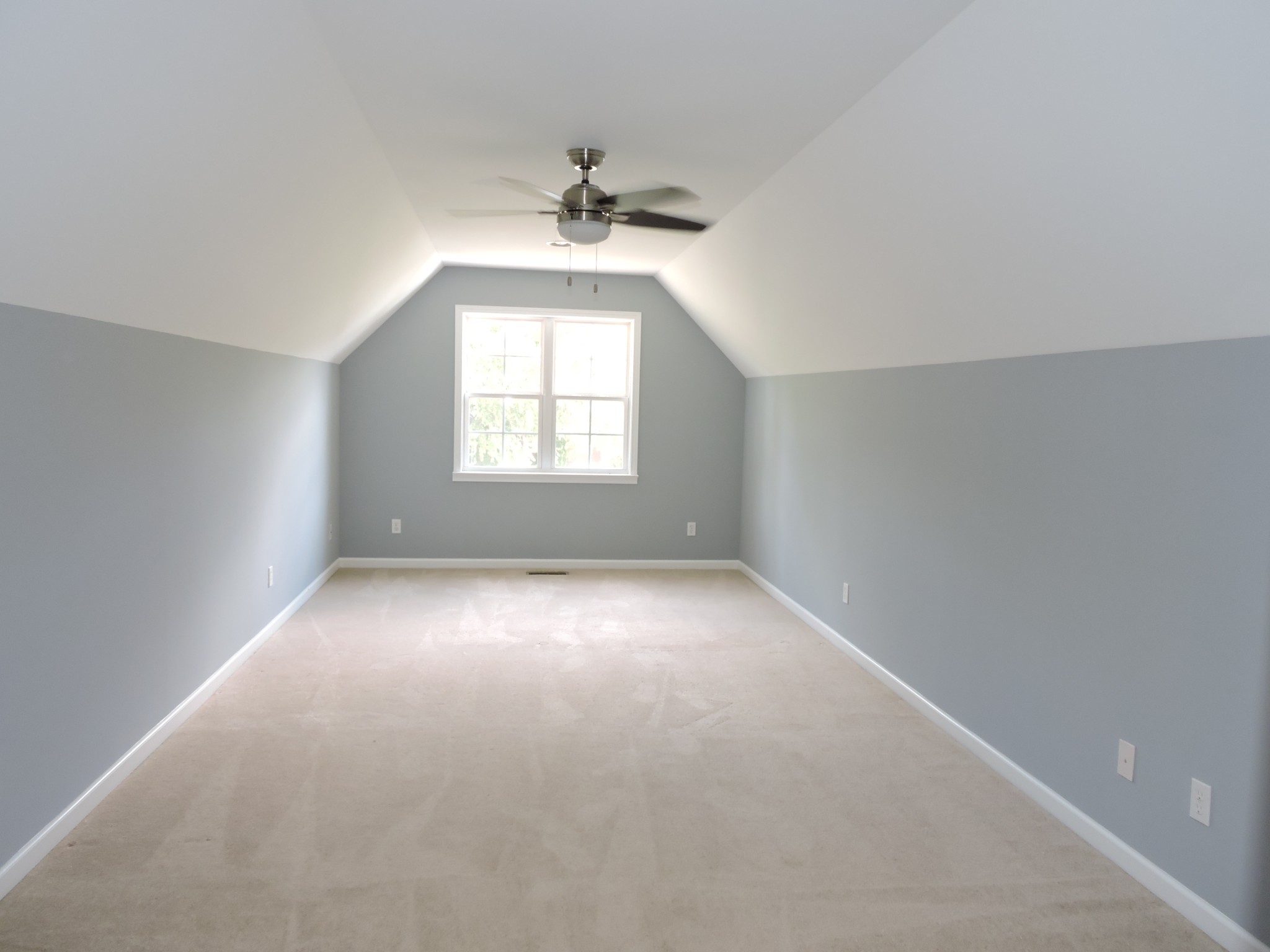 187 Oak Hollow Road Manchester, TN 37355 - Photo 18 of 25 an empty room with a window and a chandelier fan