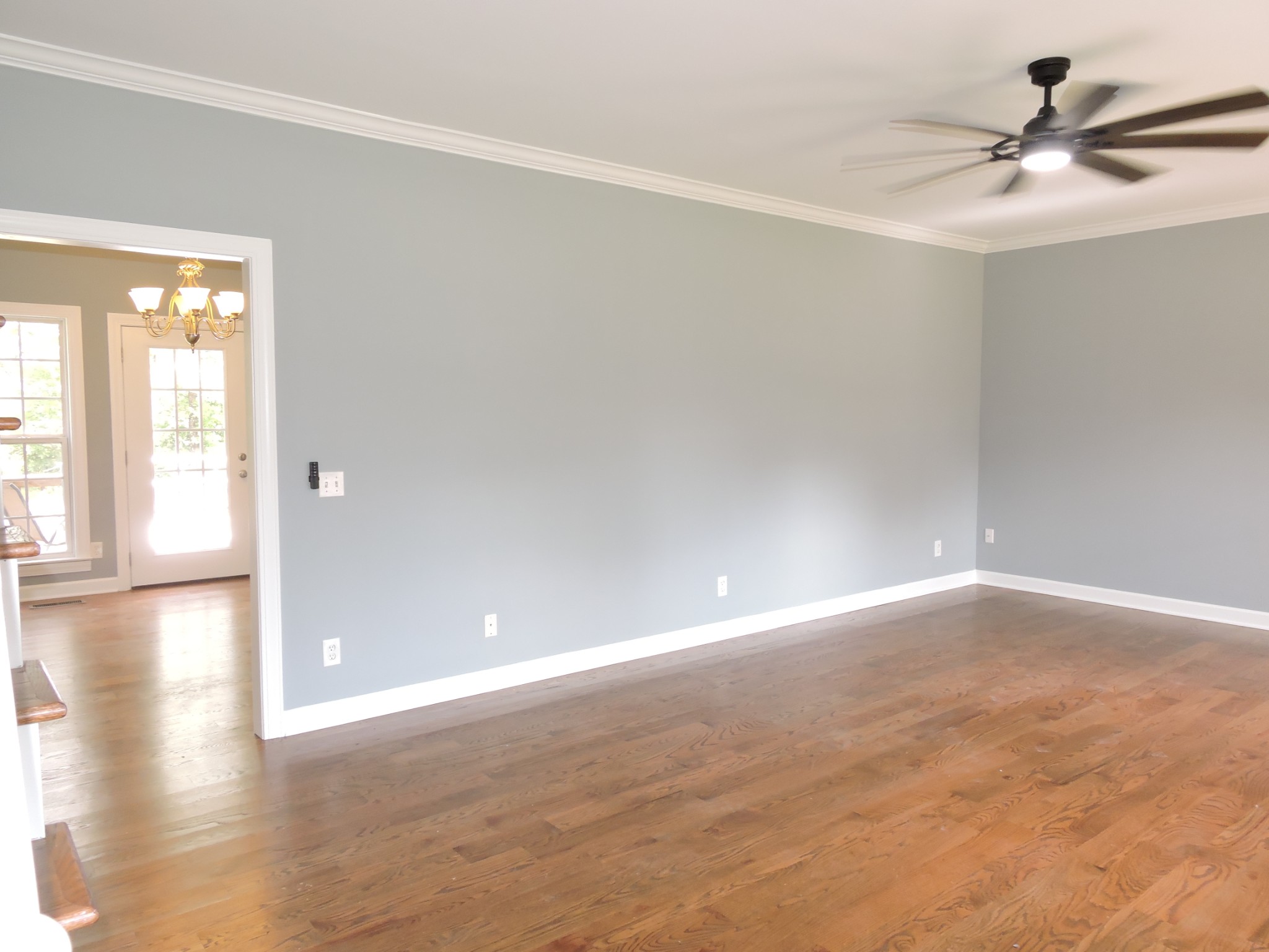 187 Oak Hollow Road Manchester, TN 37355 - Photo 4 of 25 a view of an empty room with window and wooden floor
