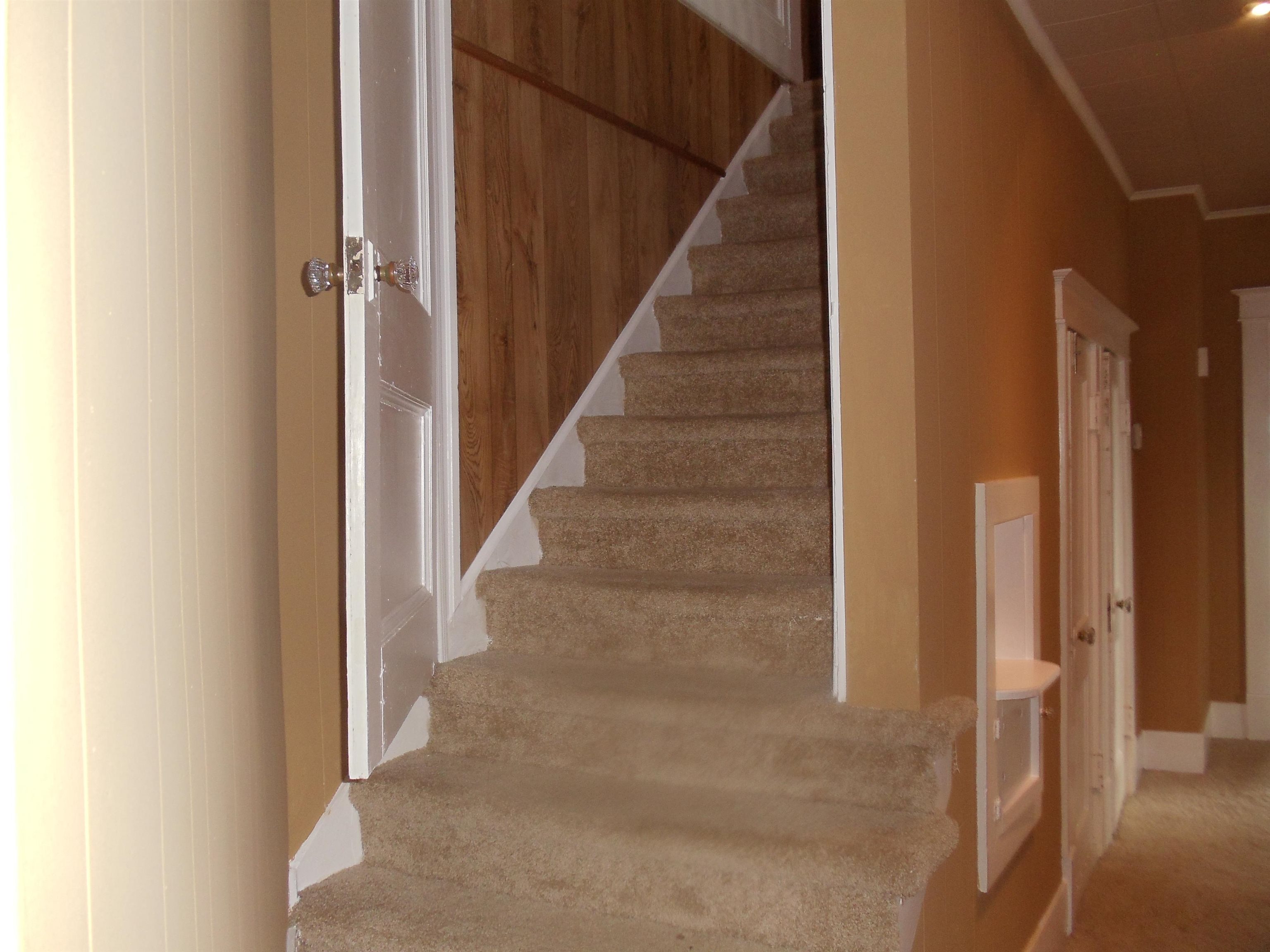262 Lake Drive Ripley, TN 38063 - Photo 15 of 25 a view of staircase with white walls and windows