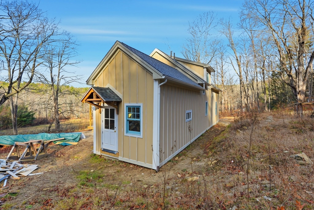 63 Cooleyville Road New Salem, MA 01355 - Photo 30 of 39 a view of outdoor space and front view of a house