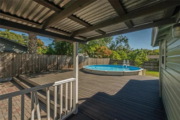 a view of outdoor space deck and furniture