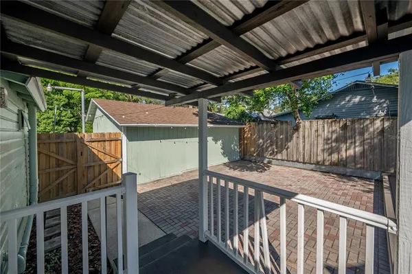 a view of backyard with green space
