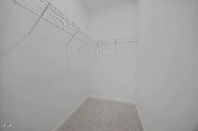 a bathroom with a double vanity sink toilet mirror and shower