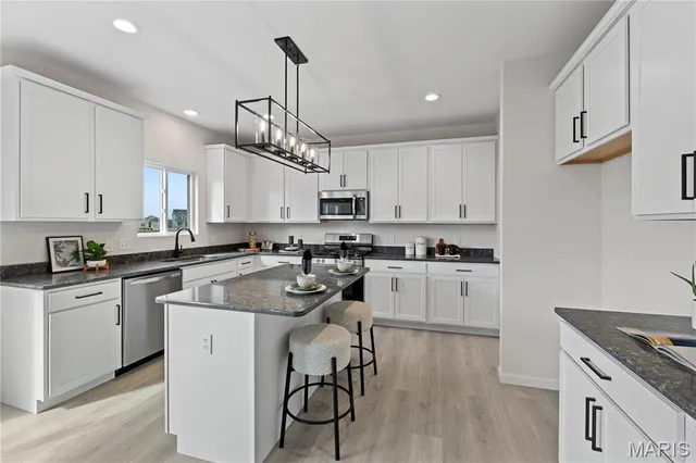 $557,068 | 3291 River Breeze Court, St. Charles, MO 63301