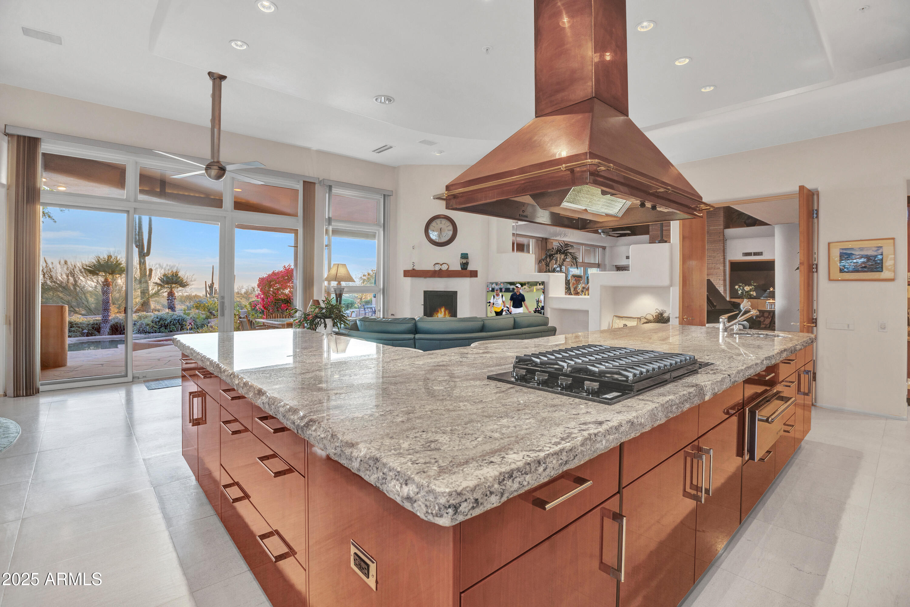 10040 East Happy Valley Road, Unit 595 Scottsdale, AZ 85255 - Photo 13 of 48 a kitchen with stainless steel appliances granite countertop a sink and a stove