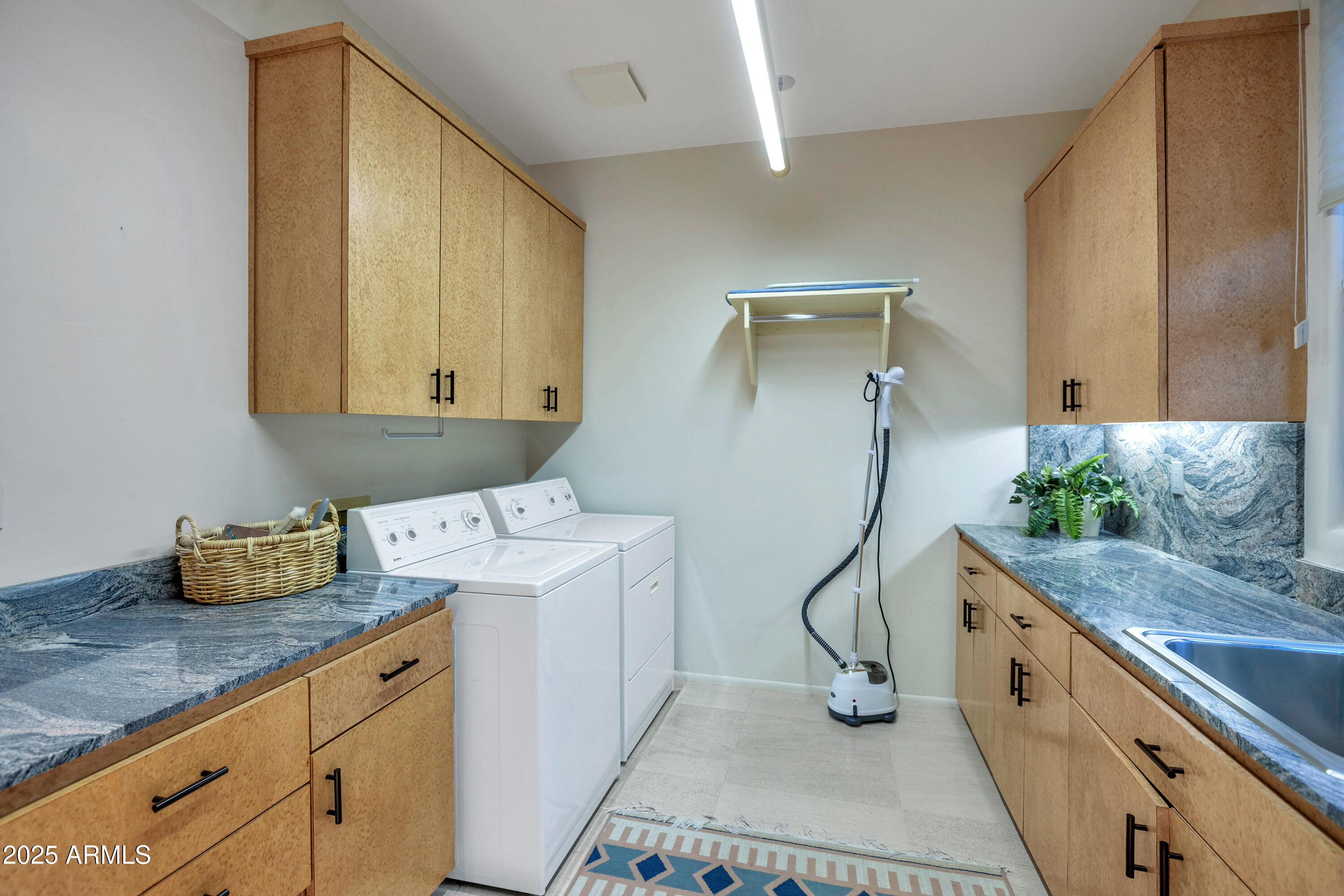 10040 East Happy Valley Road, Unit 595 Scottsdale, AZ 85255 - Photo 36 of 48 a room with storage and utility