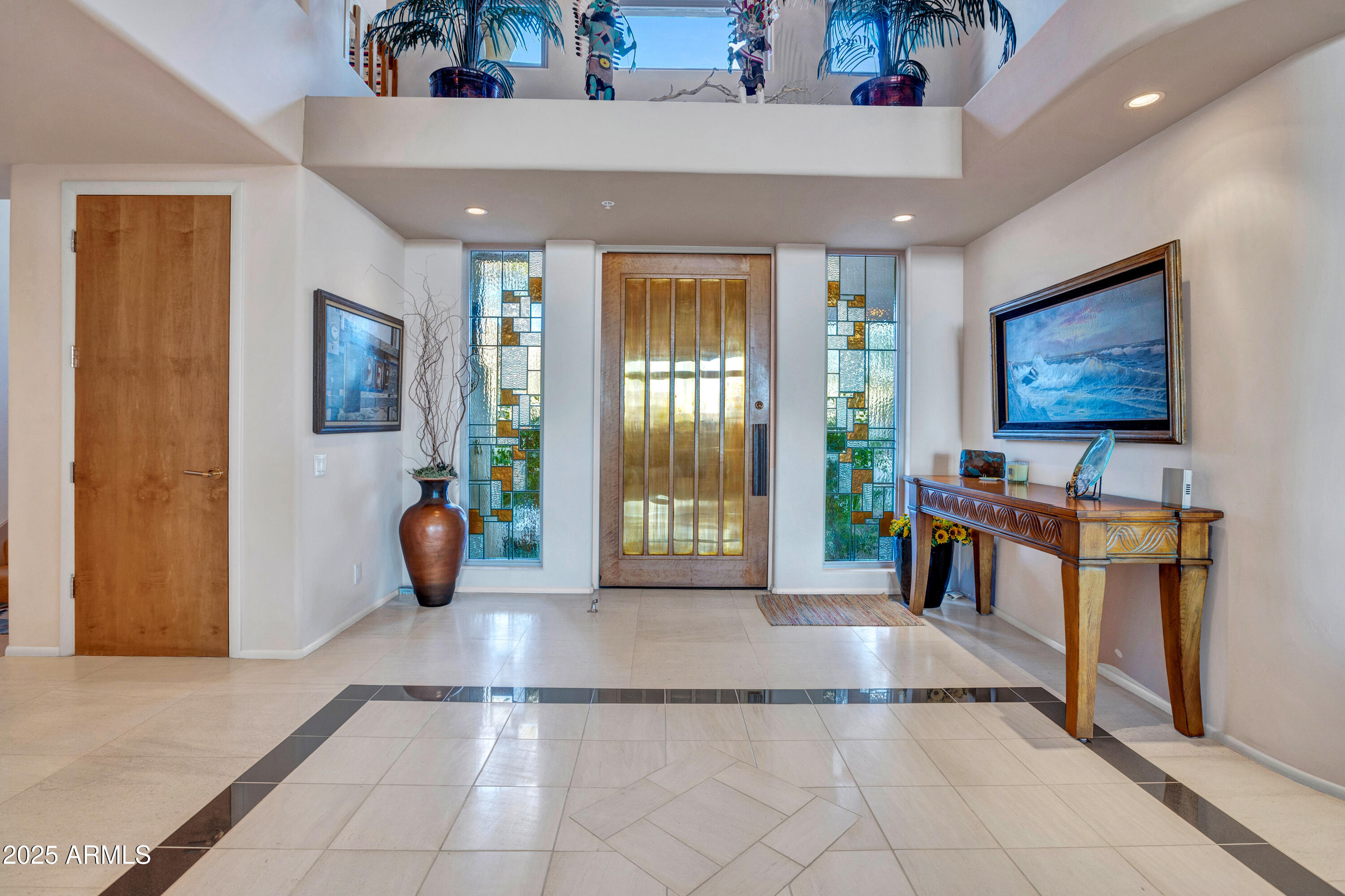 10040 East Happy Valley Road, Unit 595 Scottsdale, AZ 85255 - Photo 6 of 48 a view of a livingroom with furniture and staircase