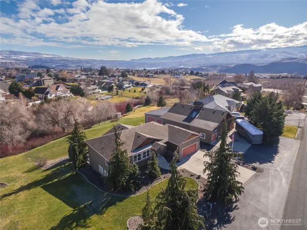 an aerial view of a house with a garden