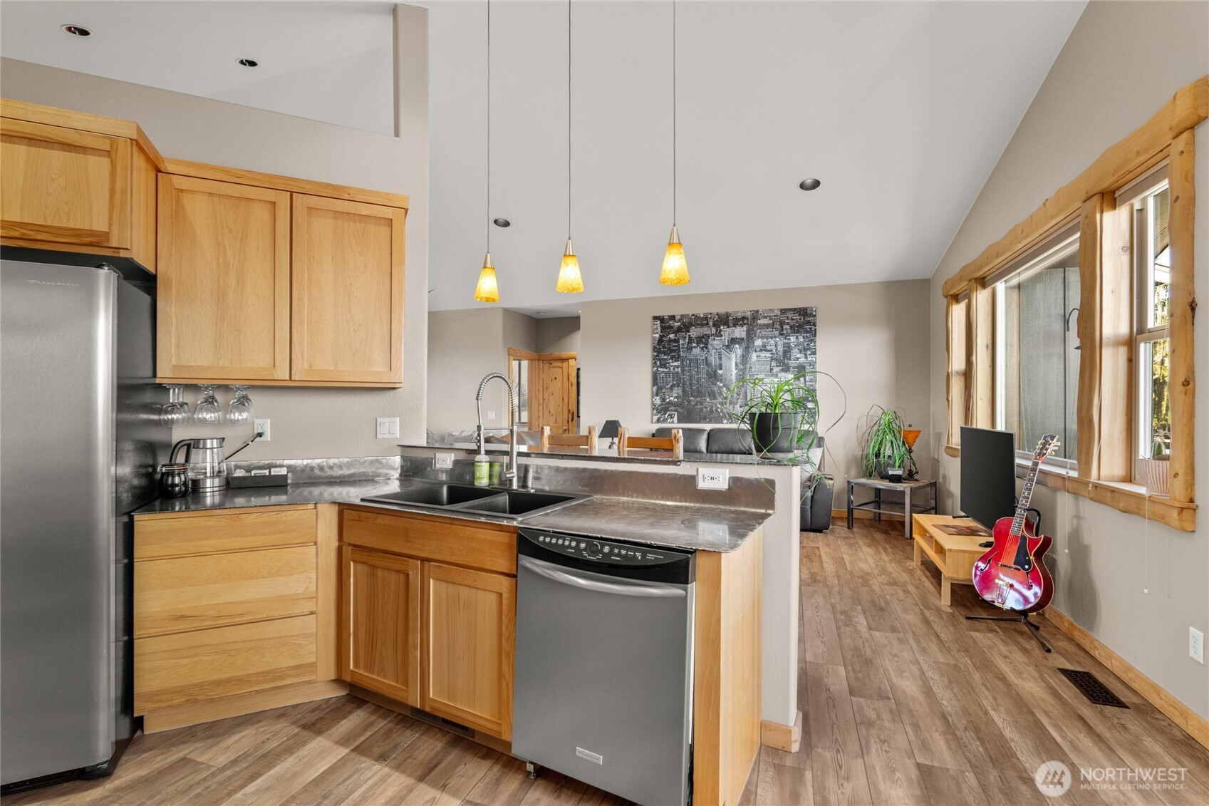 3765 Lovell Road Wenatchee, WA 98801 - Photo 11 of 40 a kitchen with a sink stove and cabinets