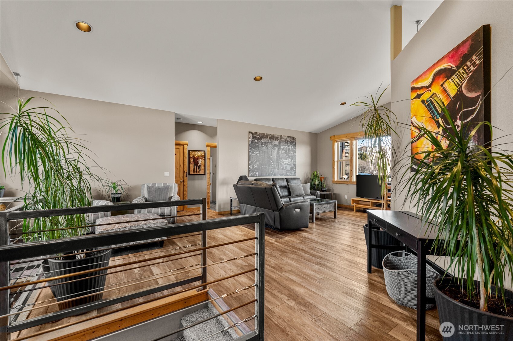3765 Lovell Road Wenatchee, WA 98801 - Photo 5 of 40 a living room with furniture and a flat screen tv