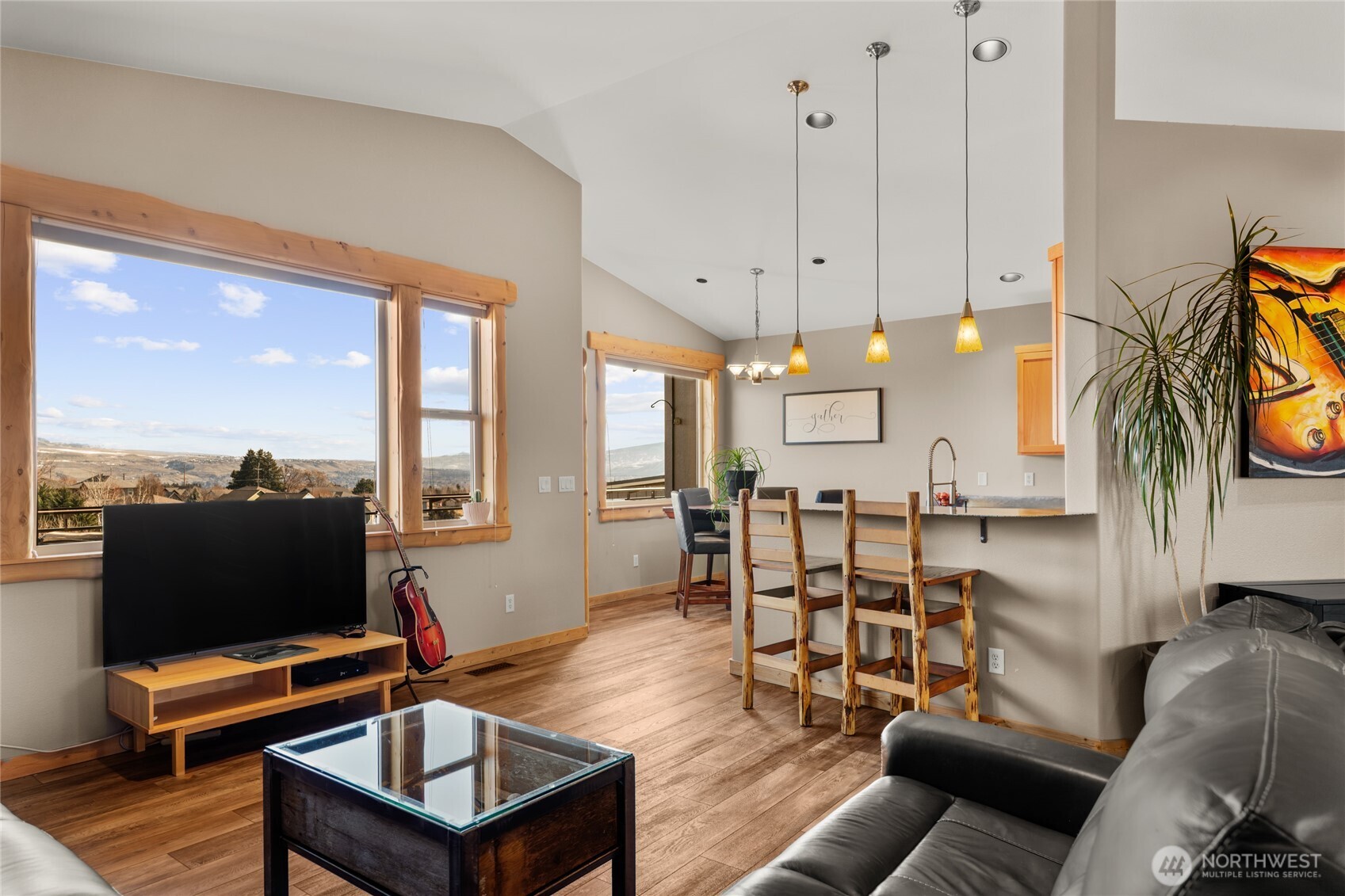 3765 Lovell Road Wenatchee, WA 98801 - Photo 8 of 40 a living room with furniture a rug and a floor to ceiling window
