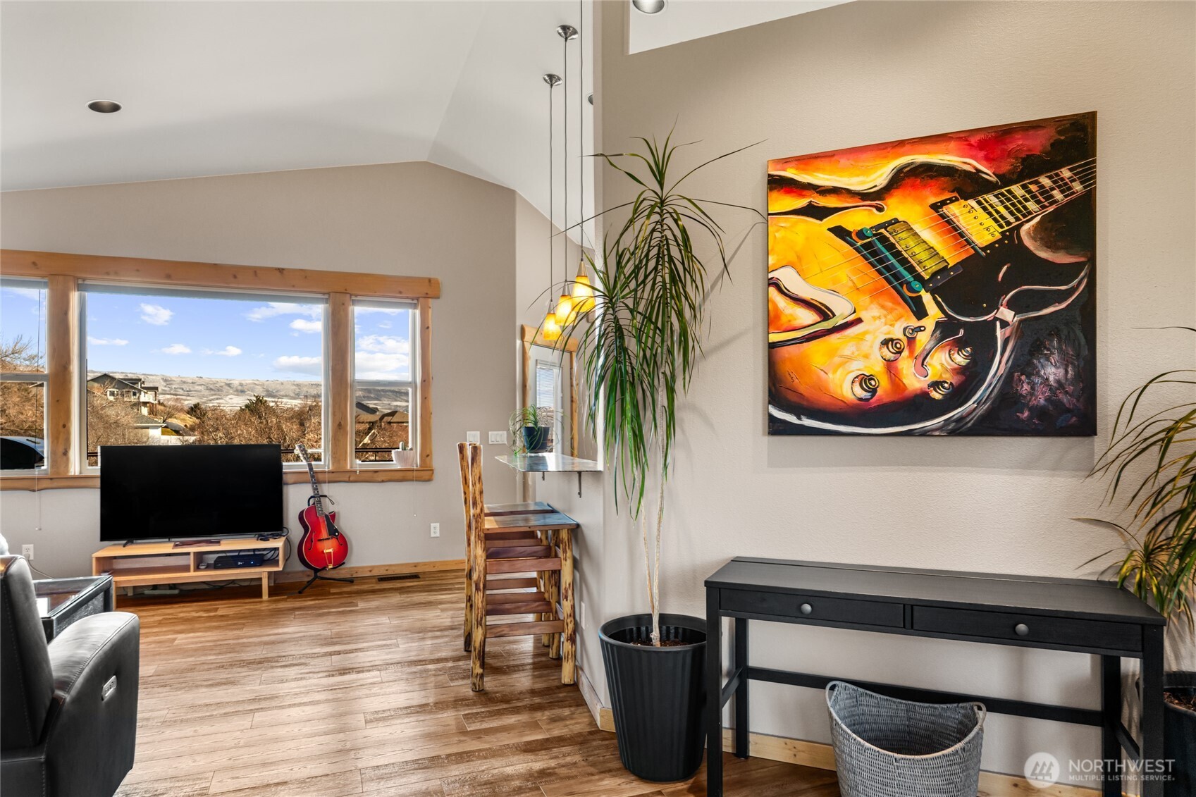 3765 Lovell Road Wenatchee, WA 98801 - Photo 9 of 40 a living room with furniture and a flat screen tv