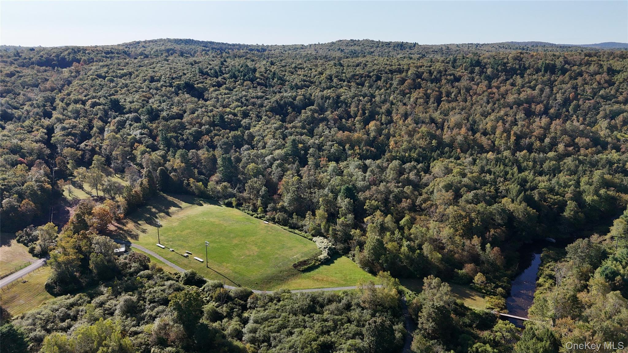 Town Park Road Monticello, NY 12701 - Photo 9 of 12 Aerial overview of property's location featuring a heavily wooded area
