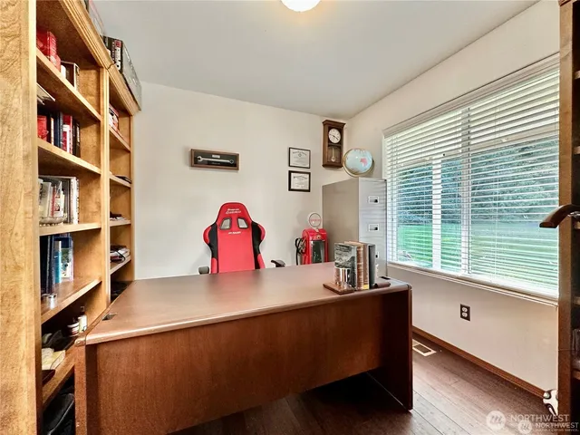 a room with furniture and a window