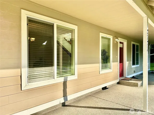a view of a door and a window