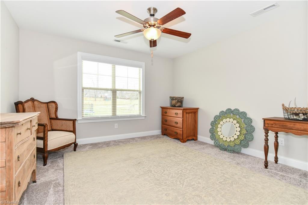 7434 Princess Ann Court Rural Hall, NC 27045 - Photo 22 of 30 Bedroom 3 is spacious and near another full bath.