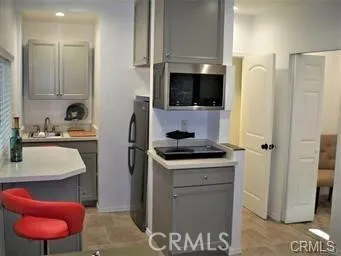 a backyard of a house with large trees