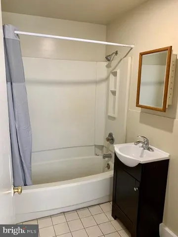 a bathroom with a sink and a bathtub
