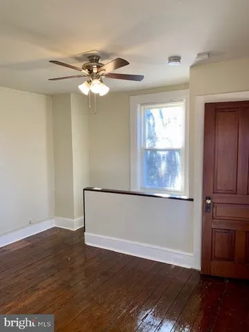 a view of a livingroom with wooden floor