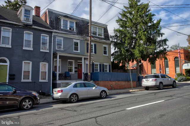 a view of a cars parked in front of a building