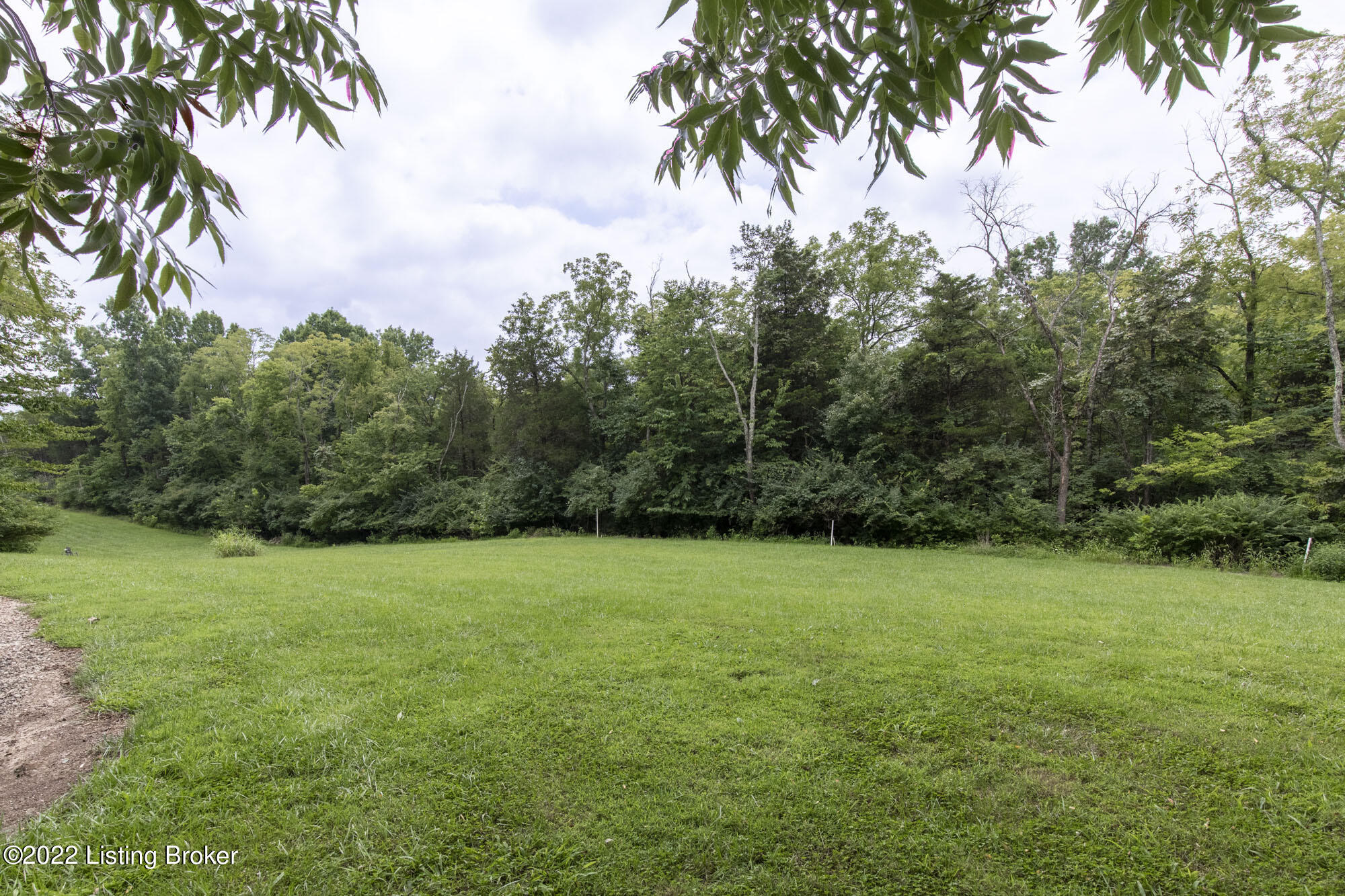 17208 Creek Ridge Road Louisville, KY 40245 - Photo 62 of 65 cleared area 35' gas line easement just past the barn. see overhead view of property. Property lines go well into the woods.